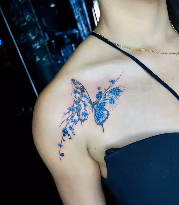 Butterfly and flower color tattoo