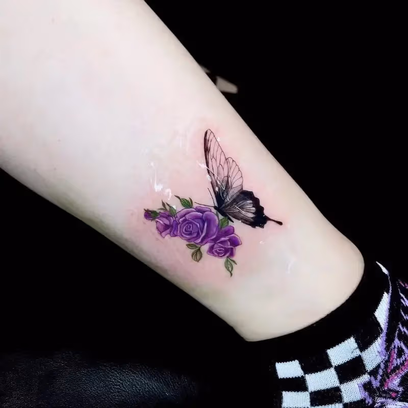 Butterfly and rose tattoo