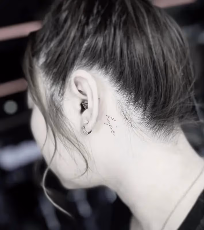 ‘hope’ lettering tattoo