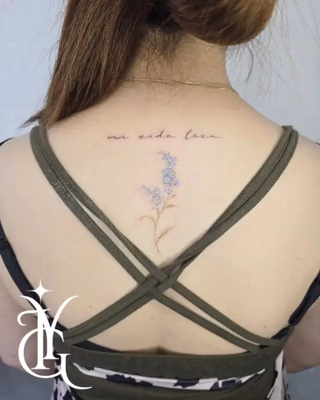 Flower x lettering tattoo
